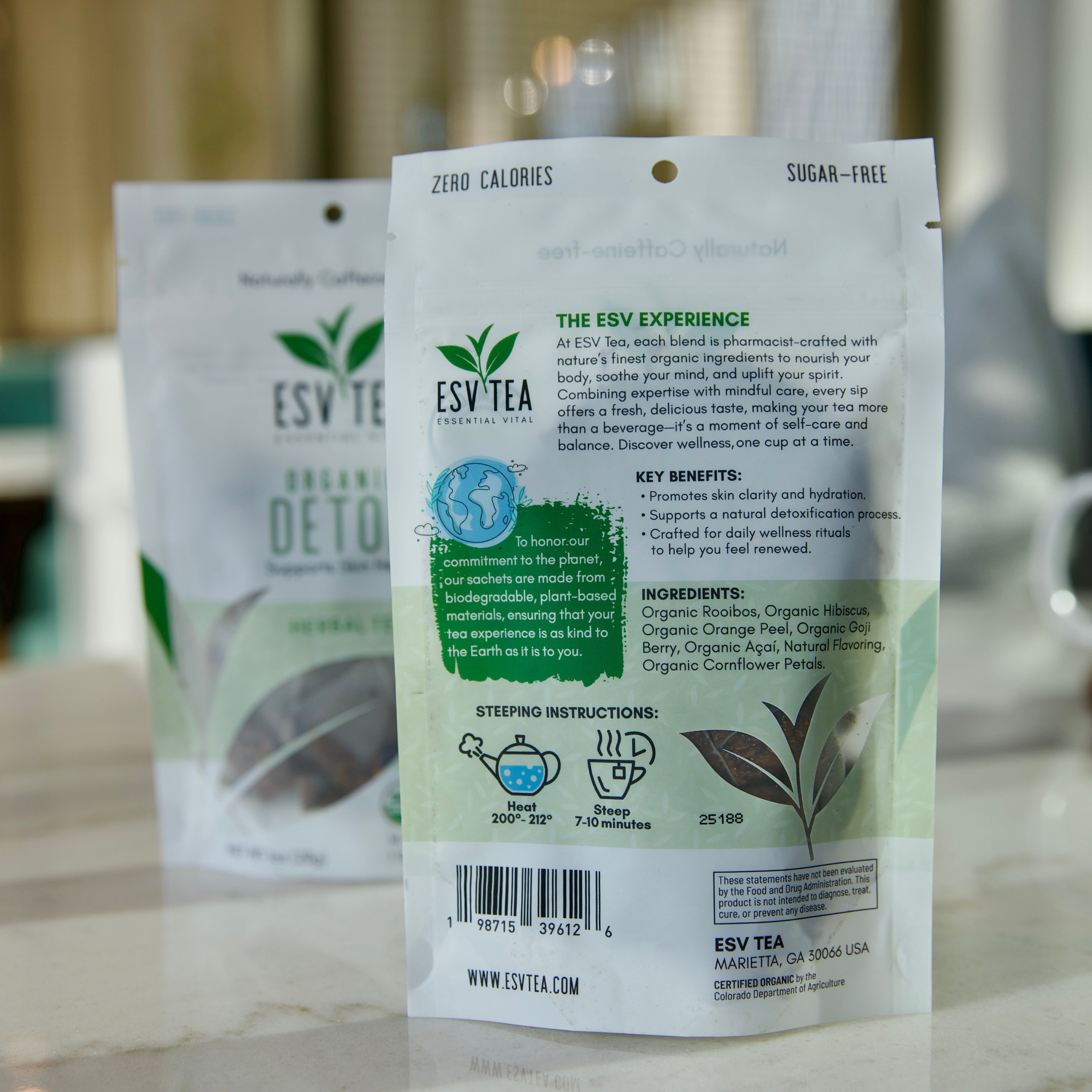 ESV Tea package with branding and product details on a blurred background